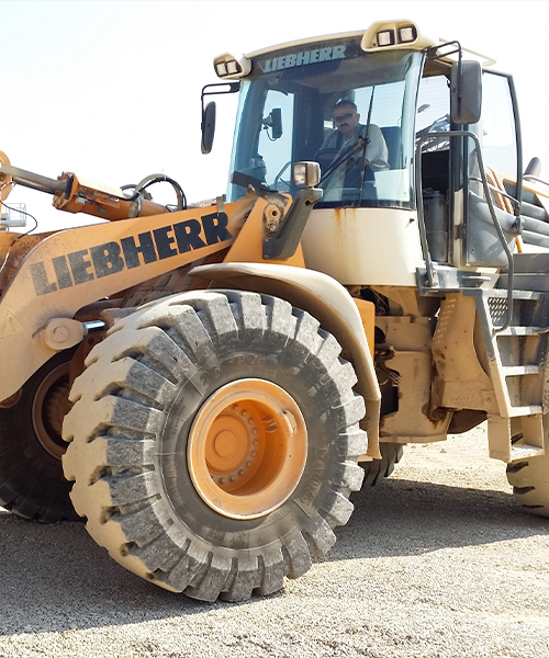 MA05 earthmoving tire fitted on a Wheel Loader, providing excellent traction, stability, and durability for demanding job sites.