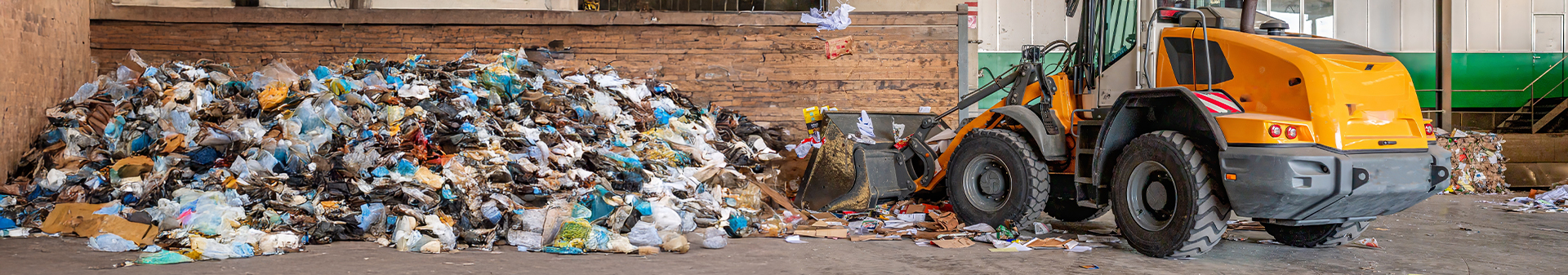 Solid tires designed for waste management and heavy-duty equipment.